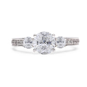 Round Diamond Trilogy With Diamond Shoulders Engagement Ring