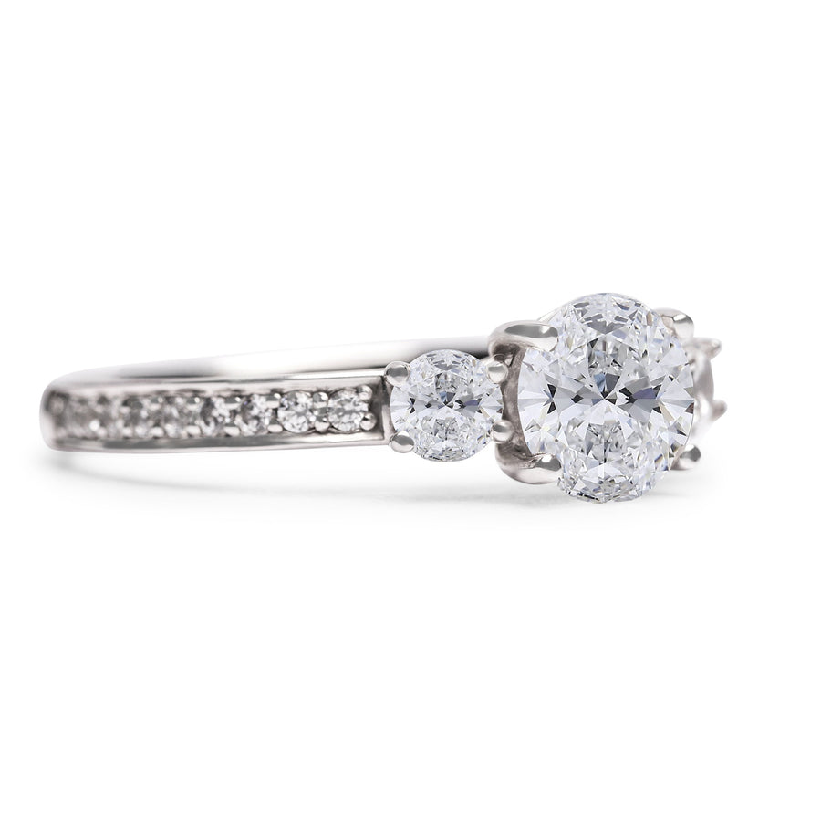 Round Diamond Trilogy With Diamond Shoulders Engagement Ring