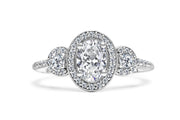 Halo Oval Trilogy Engagement Ring