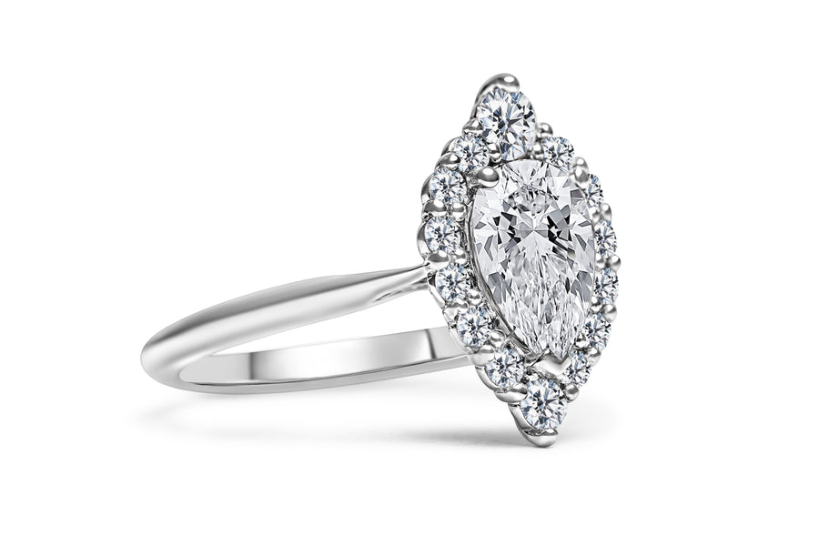 Pear Diamond With Graduating Halo Engagement Ring