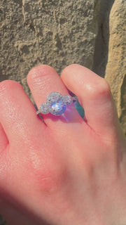 Halo Oval Trilogy Engagement Ring