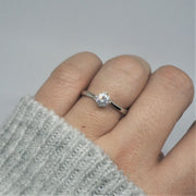 Solitaire Twist Engagement Ring