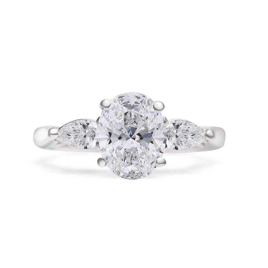 Oval Cut Solitaire With Pear Cut  Shoulders Engagement Ring