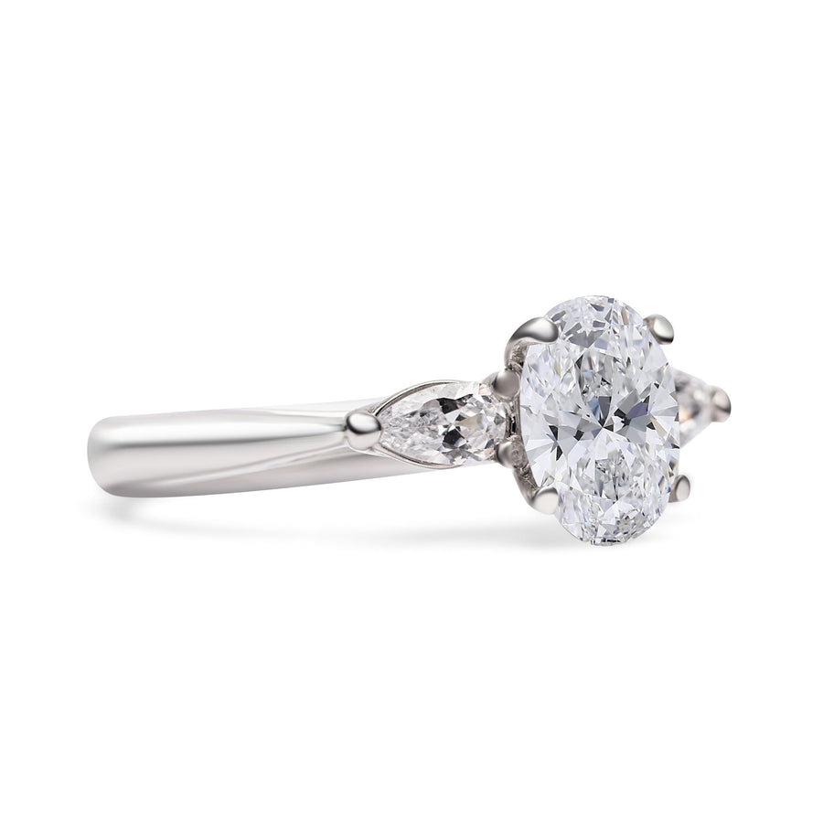 Oval Cut Solitaire With Pear Cut  Shoulders Engagement Ring