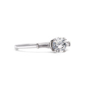 Brilliant Cut With Tapered Baguette Shoulders Engagement Ring