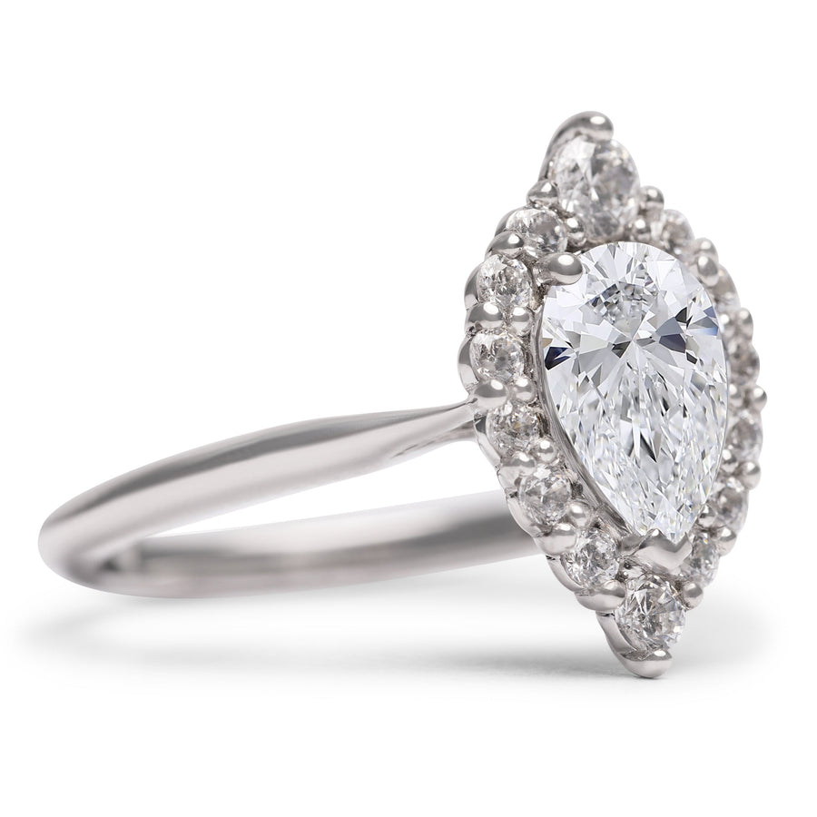 Pear Diamond With Graduating Halo Engagement Ring