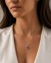 18ct White Gold, Ruby And Diamond Cluster Halo Pendant Necklace