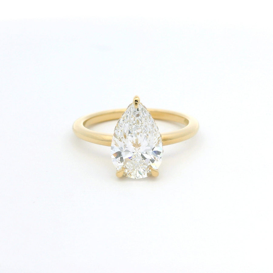 18ct Yellow Gold Pear Cut Lab Grown Diamond Solitaire With Hidden Halo And Talon Claws Engagement Ring