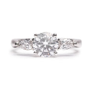 Brilliant Cut Solitaire With Pear Cut Shoulders Engagement Ring