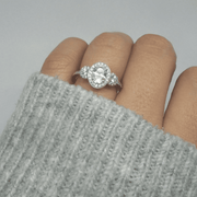 Halo Oval Trilogy Engagement Ring