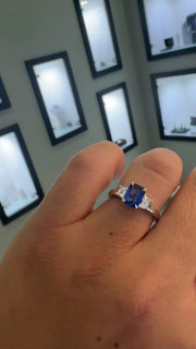 Platinum Sapphire and Trapezoid Diamond Trilogy Ring