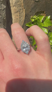 Pear Diamond With Graduating Halo Engagement Ring