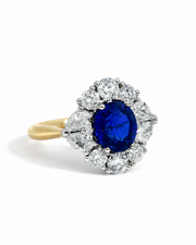 Sapphire & Diamond Pear and Round Brilliant Cut Halo Ring